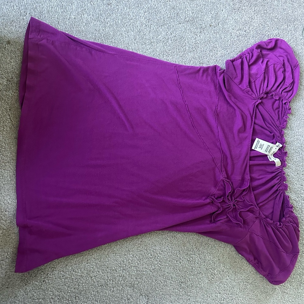 Purple short sleeve shirt with flower detail